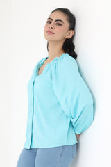 RUFFLE ELEGANCE TOP-SKY-BLUE